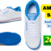 A woman is walking outside wearing comfortable white Reebok Sneakers